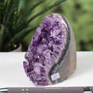 Uruguay Amethyst mini geode with intense purple crystals, unique piece number 10 on display