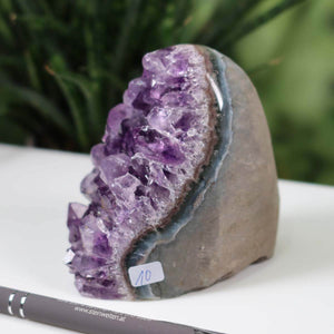 Uruguay Amethyst Mini Geode with intense violet crystals, labeled as unique piece number 10, displayed on a white surface