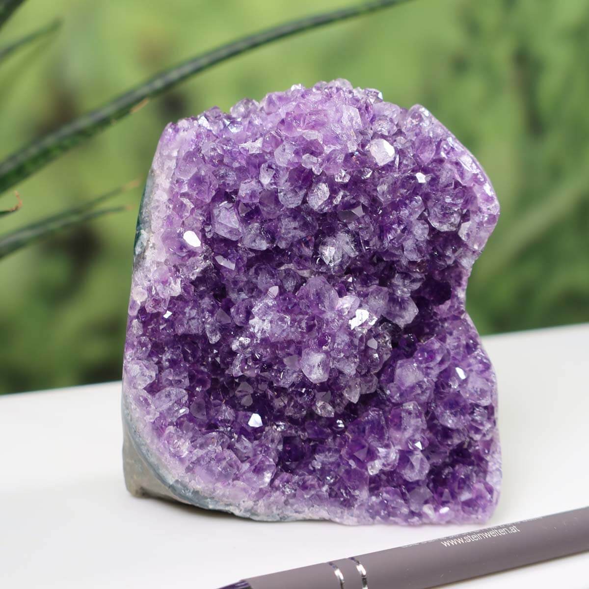 Uruguay Amethyst Mini Geode with intense violet crystals, displayed with a pen for scale, product number 22