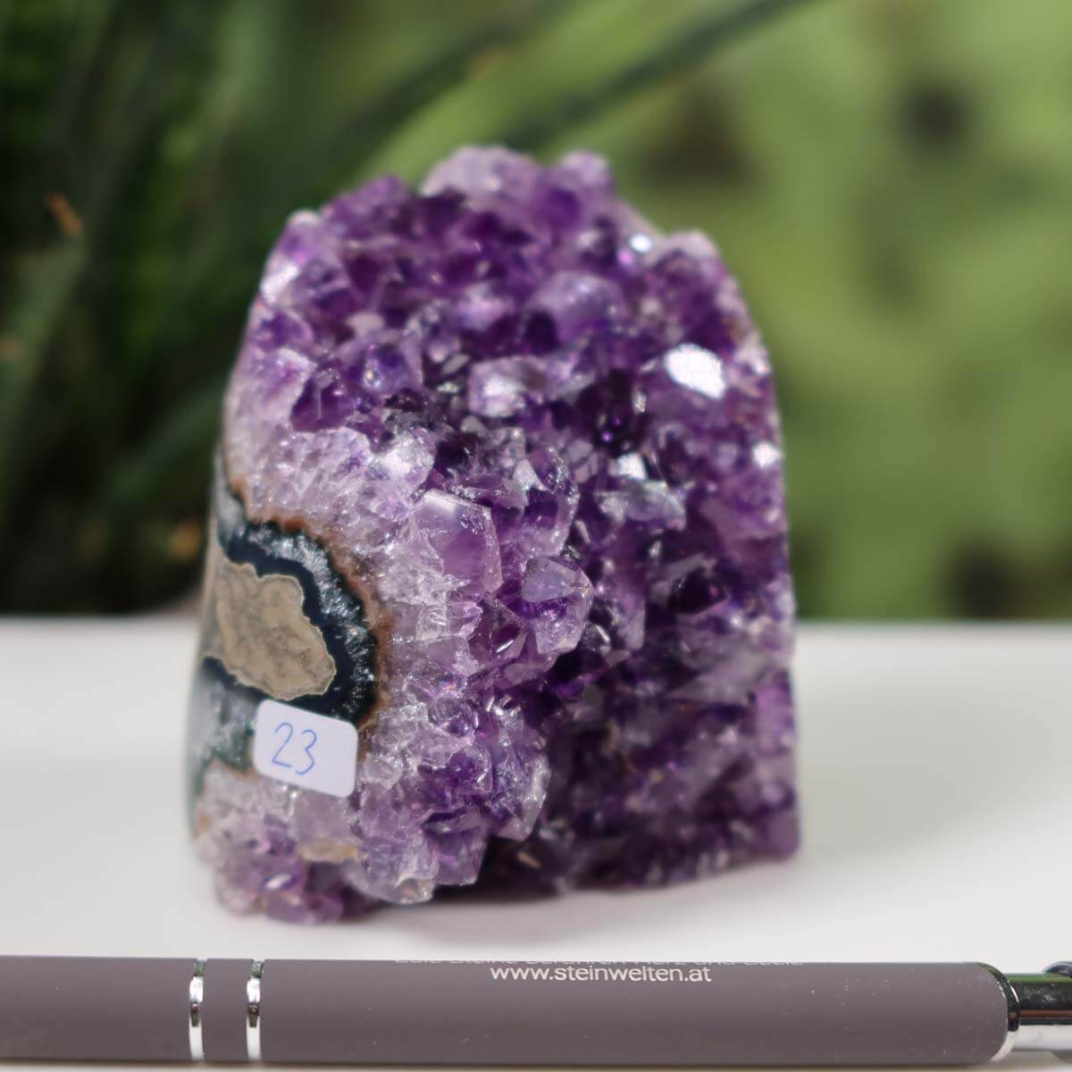 Intense purple Uruguay Amethyst mini geode unique piece number 23 on display