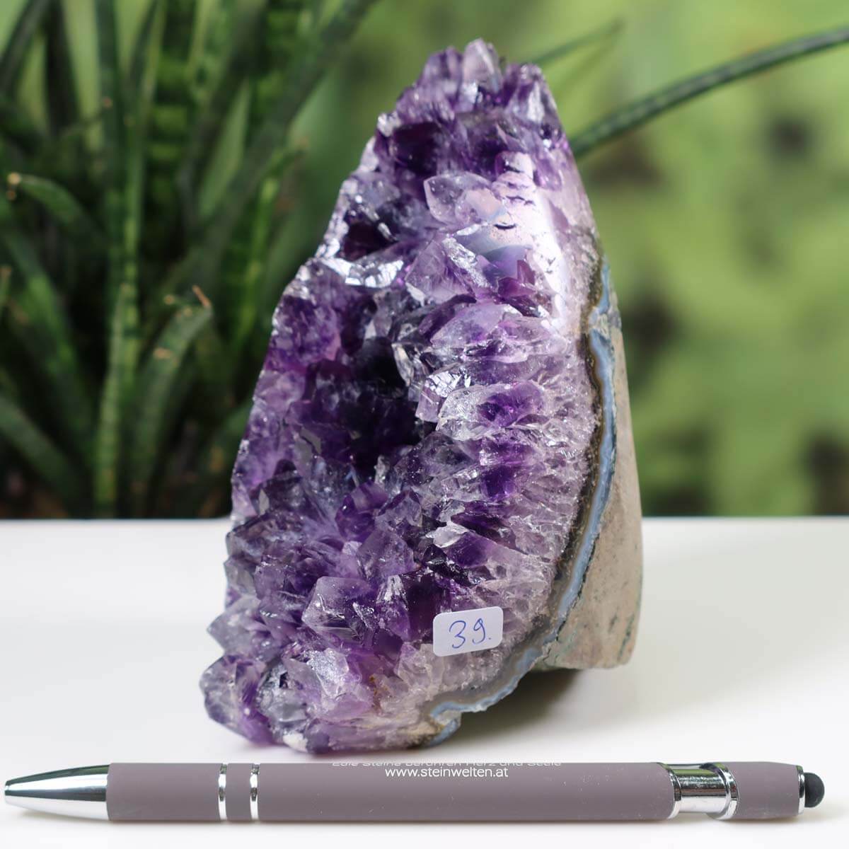 Uruguay Amethyst Mini Geode with deep purple crystals, labeled number 39, displayed with a pen for scale.