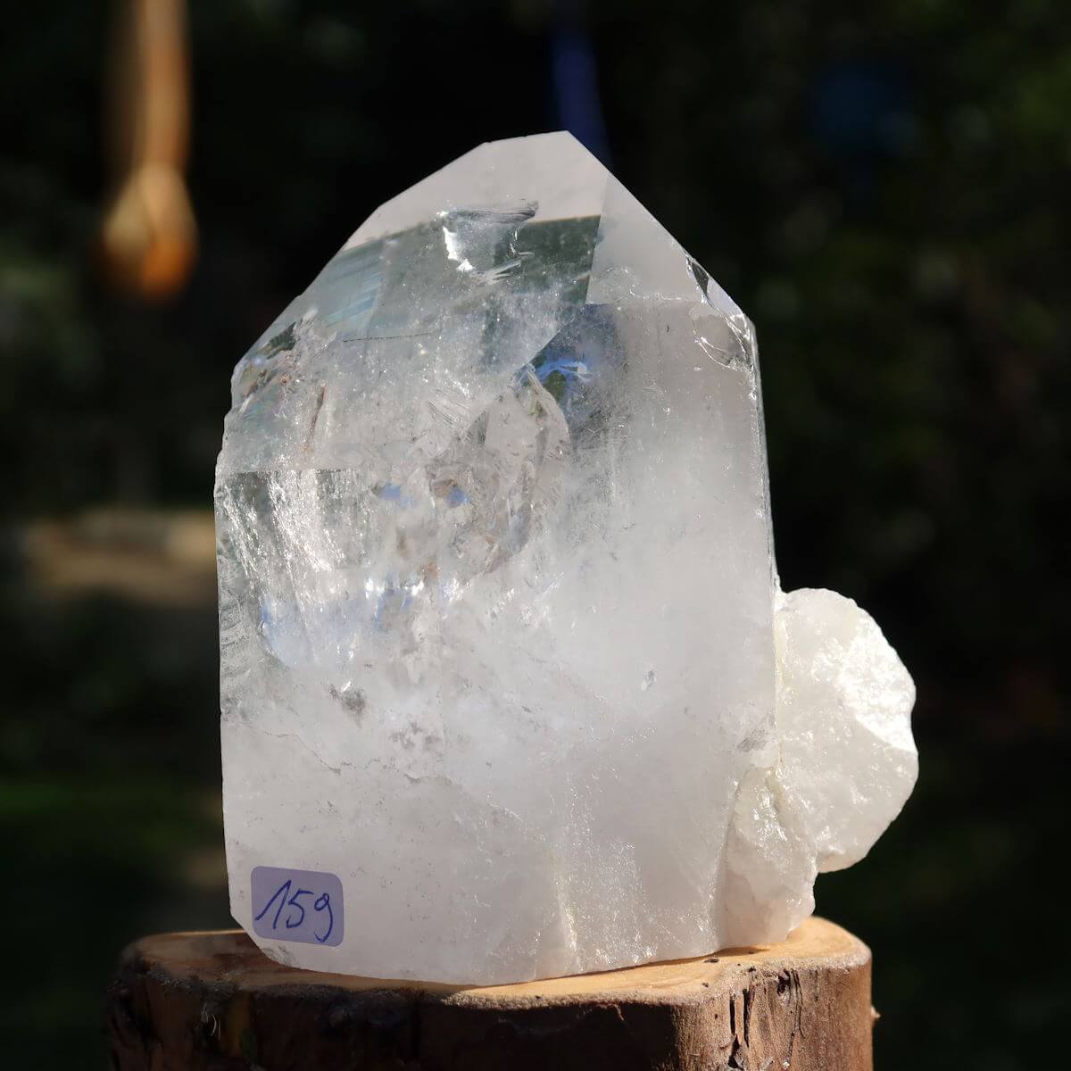 Polished quartz crystal point from Brazil, numbered 159, ideal for clarity and meditation.