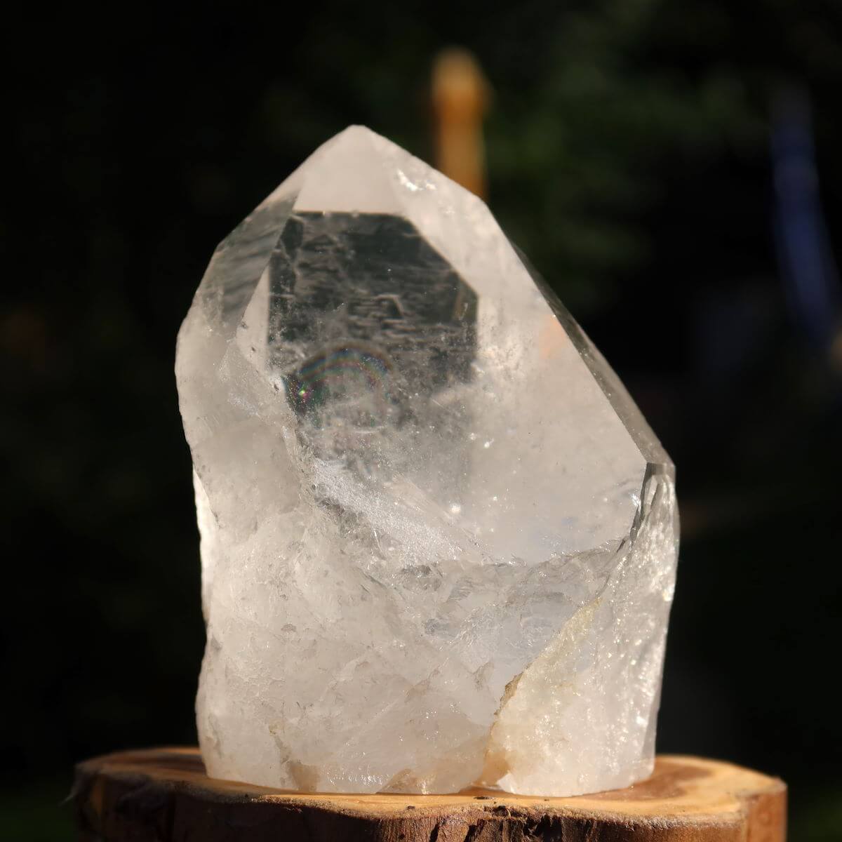 Polished Brazilian quartz crystal spike for clarity and meditation, unique gem with sparkling facets, 9x6 cm.